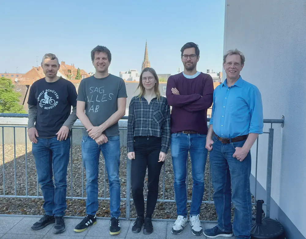 The OERSI core team – from left to right: Mirjan, Adrian, Sophie, Tobias and Axel – on a terrace at a team meeting in Hanover, May 2025